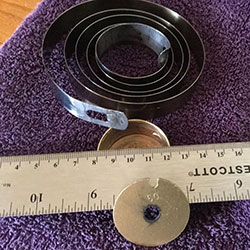 MAIN SPRING HOLE END NEW  CLOCK PARTS 7/8 wide x70 inches long