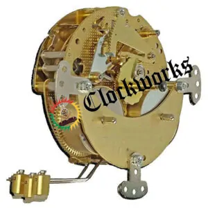 Rear angled view of the Hermle 130-020 clock movement showing the three-hammer strike mechanism and internal gear layout.