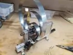 Winding the clock mainspring from