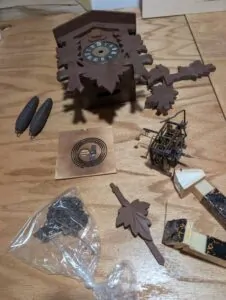 Two weight driven 1 day cuckoo clock with case weights movement bird hands bellows. German made
